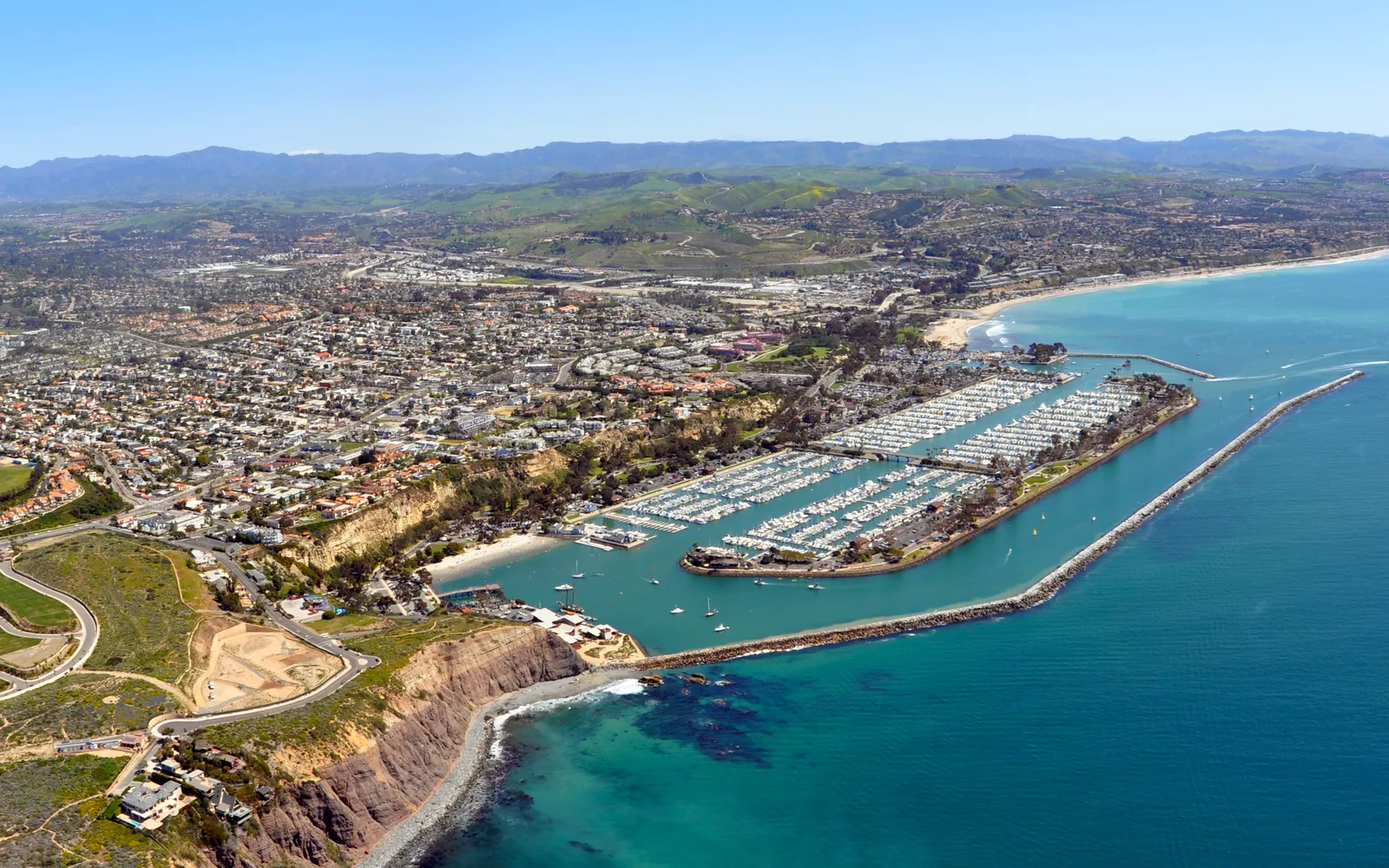 Elevated view of Dana Point and the Orange County coastline with coastal bluffs and ocean